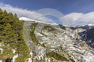 Winter pyrenes landscape near Roc Del Quer trekking trail, Village of Canillo. photo