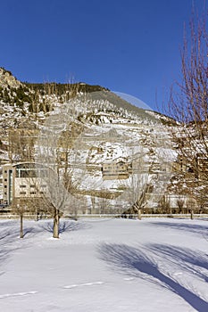 Winter pyrenes landscape near Village of Canillo, trekking and cycling trail. photo