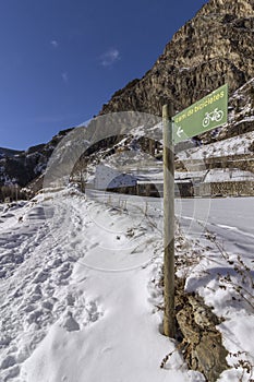 Winter pyrenes landscape near Village of Canillo, trekking and cycling trail. photo