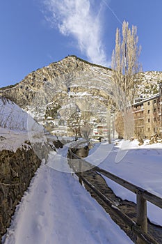 Winter pyrenes landscape near Village of Canillo, trekking and cycling trail. photo