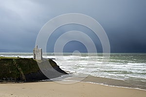 Winter rain storm approaching castle