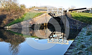 Winter reflection of a canal lock