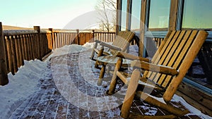 Winter relaxation cabin balcony deck chairs.