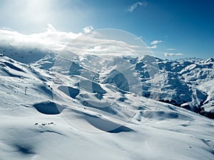 Winter resort valley drone view in French Alps