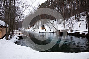 Winter river with diving platforms