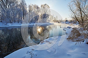 The winter river and snow landscape