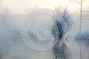 The winter river and soft rime sunrise