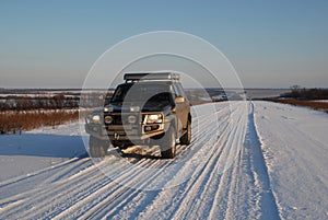 Winter road with car 4x4