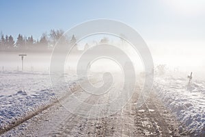 Winter road with off-road car