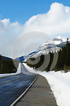 winter road in rocky mountains