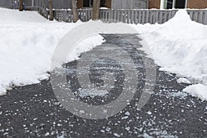 Winter road with salt for melting snow