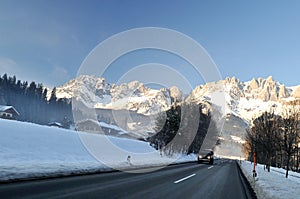 Winter road transient in Alps