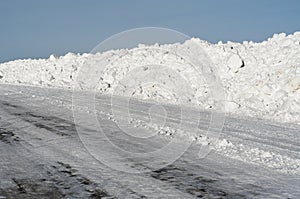 Winter road under blue sky