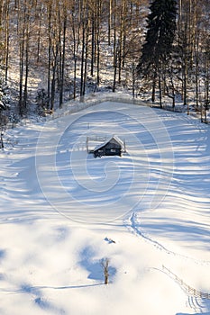 Winter in Roumania village , beautiful Transylvanian landscape in winter time , snow and freezing cold whether