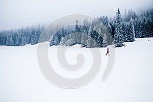 Winter running woman, jogging inspiration and motivation