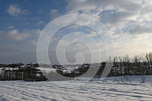 Winter rural landscape under the snow