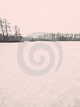 Winter rural scene with fog and white fields - retro vintage eff