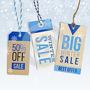 Winter sale realistic tags on winter background