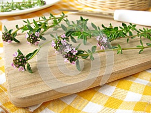 Winter savory on cutting board