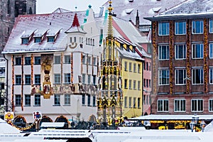 Winter scene- Beautiful Fountain (SchÃÂ¶ner Brunnen) Nuremberg, Germany photo