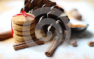 Winter scene.biscuits ties with ribbon. Dried Herbs and Spices like a Christmas background