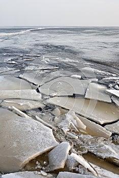 Winter scene at a frozen lake