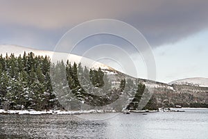 Winter scene at Loch Morlich in the Cairngorms National Park of Scotland.