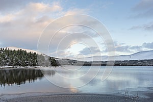 Winter scene at Loch Morlich in the Cairngorms National Park of Scotland.