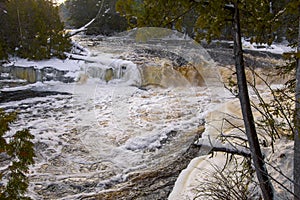 Winter Scene At Lower Tahquamenon Falls In Michigan