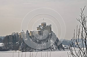 Winter scene panorama in Tatra mountains with castle of the Witcher