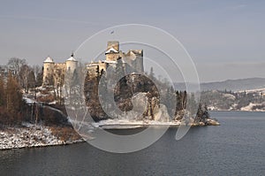 Winter scene panorama in Tatra mountains with castle of the Witcher