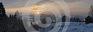 Winter scene panorama in Tatra mountains with snow and sunset