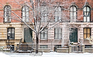 Winter scene with snow covered sidewalks in the East Village of New York City