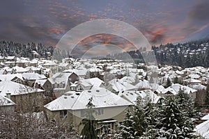 Winter Scene in Suburbs Neighborhhood with Sunset Sky