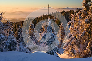 Winter scene during sunset from Velka Raca mountain in Kysucke Beskydy