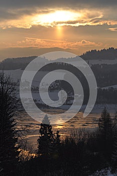 Winter scene in Tatra mountains with snow and sunset