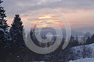 Winter scene in Tatra mountains with snow and sunset