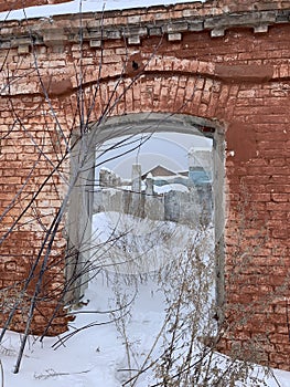 Winter scenery through broken window photo