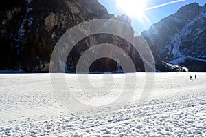 Winter scenery of frozen lake Braies at Dolomites alps Italy