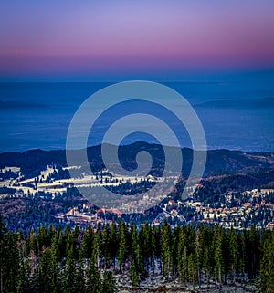 Winter scenery with Poiana Brasov ski resort in Romania