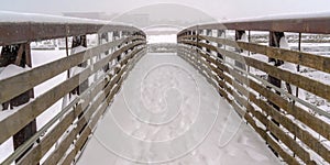 Winter scenery with snowy bridge in Daybreak Utah