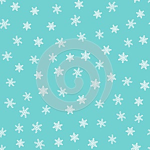 Winter seamless pattern. Drawn by hand. White snowflakes on blue background.