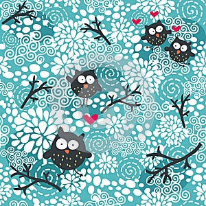 Winter seamless pattern with owls and snow.