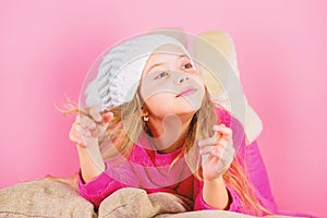 Winter season concept. Winter fashion accessory. Winter accessory concept. Girl long hair dream pink background. Kid