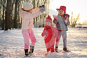 Winter season. Playing on snow.