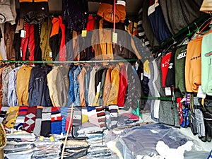 winter season special men fashion jackets hanging at garment store during cold weather in India dec 2019