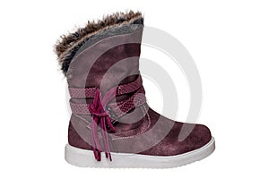Winter shoes isolated. Close-up of a single elegant violet suede leather winter boots and lined with brown fur. Girls winter shoe