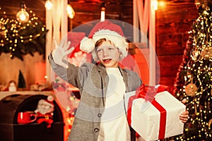 Winter shopping sales. Christmas spirit. Unpacking christmas gift. Best wishes. Winter holiday tradition. Kid happy with