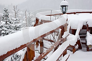 Winter ski chalet and cabin in snow mountain