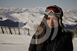 Winter, ski - woman enjoying winter on ski vacation